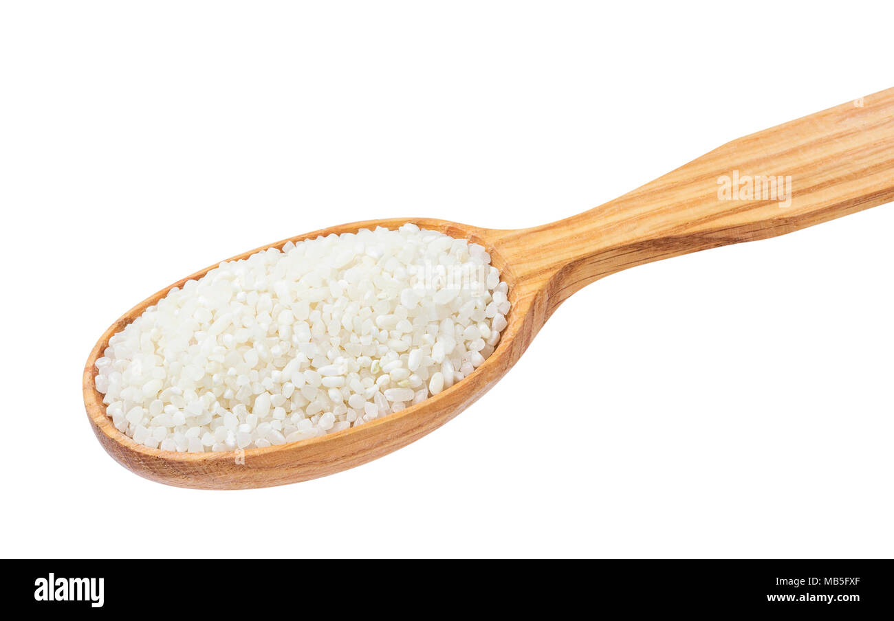 Small crushed rice in wooden spoon isolated on white background Stock ...