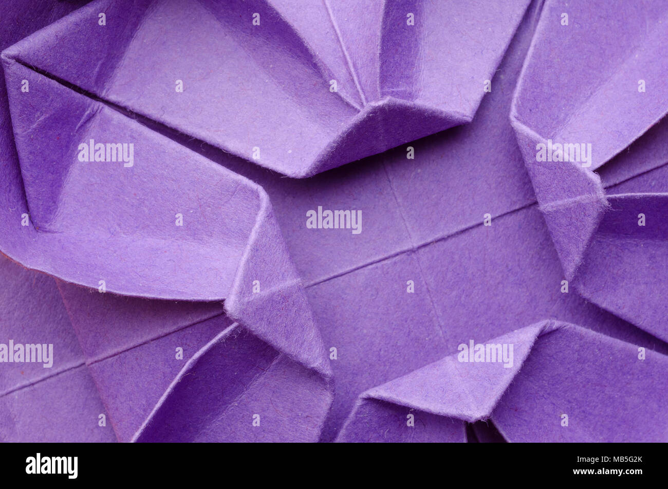 Abstract closeup of a purple paper origami flower Stock Photo