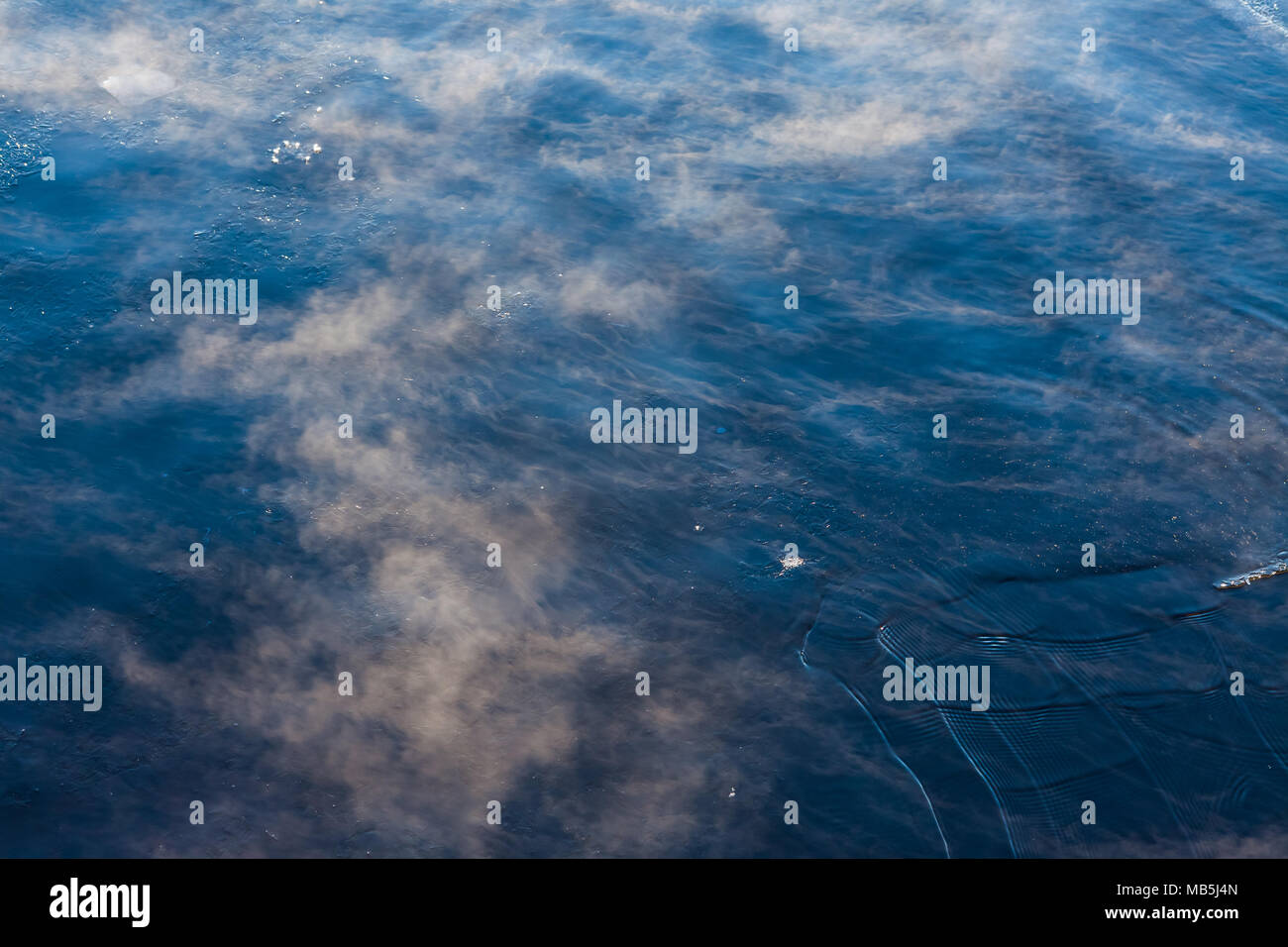 Water vapor on surface of cold water Stock Photo