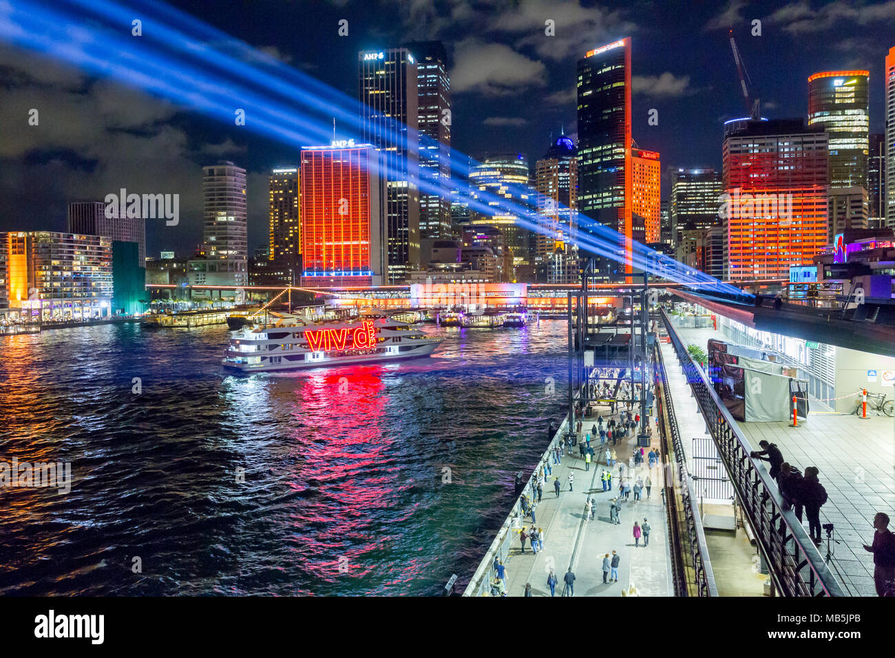 The 'Vivid Sydney' Festival takes place on Sydney Harbour in Sydney, Australia. The popular annual event, held on the shores of Sydney Harbour and previously known as the Vivid Festival, runs from May 26 to June 17, 2017. Pictured: Circular Quay seen from the Overseas Passenger Terminal. Stock Photo