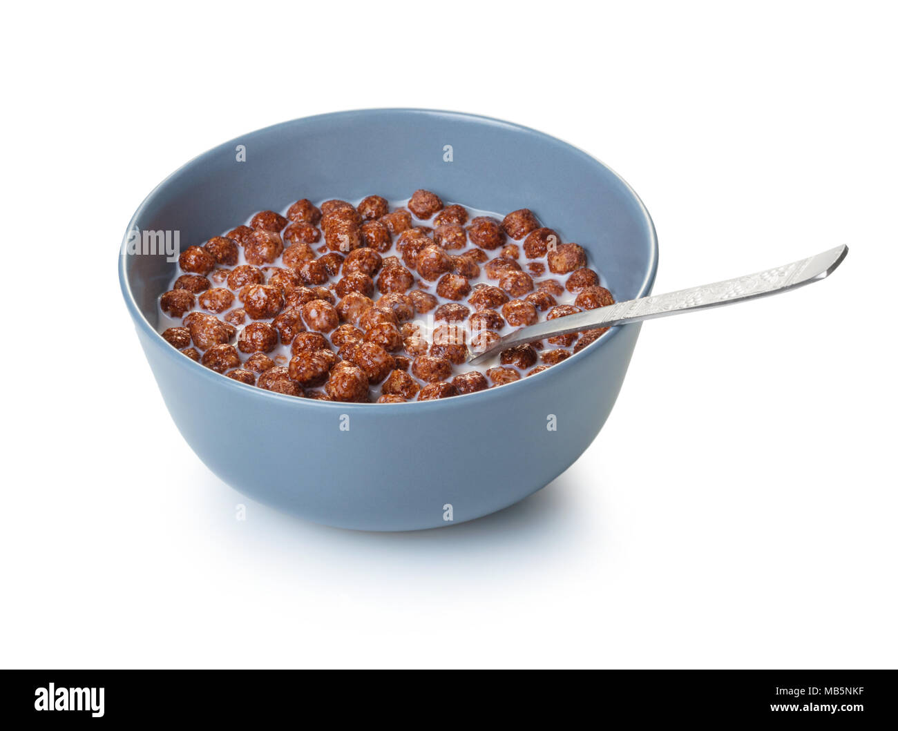 cereal balls with cocoa in milk on white isolated background Stock Photo