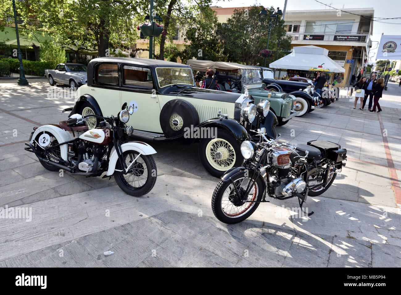 Classic motorbikes and cars during Veterans Parade Stock Photo