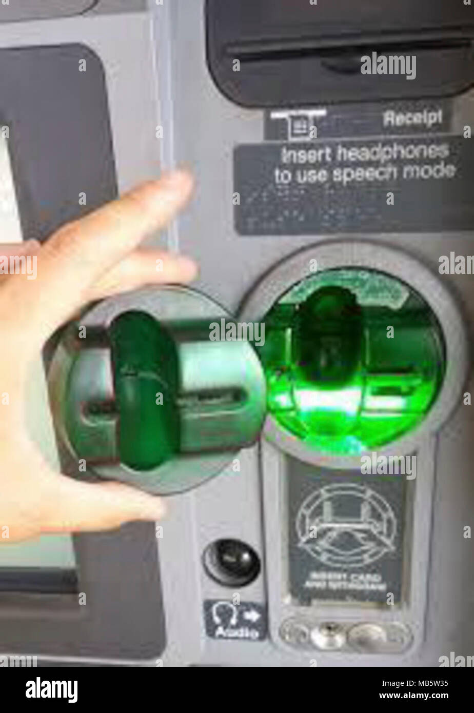 Illegal credit card "skimmers" are designed to look just like the real  scanners, and snap on easily at the pump or ATM Stock Photo - Alamy
