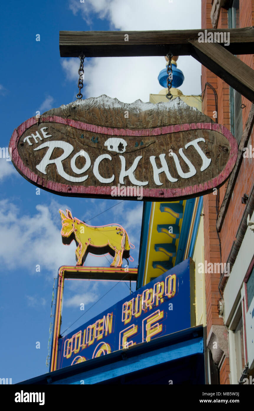 Unusual business signs dot the downtown district of Leadville, Colorado. Stock Photo