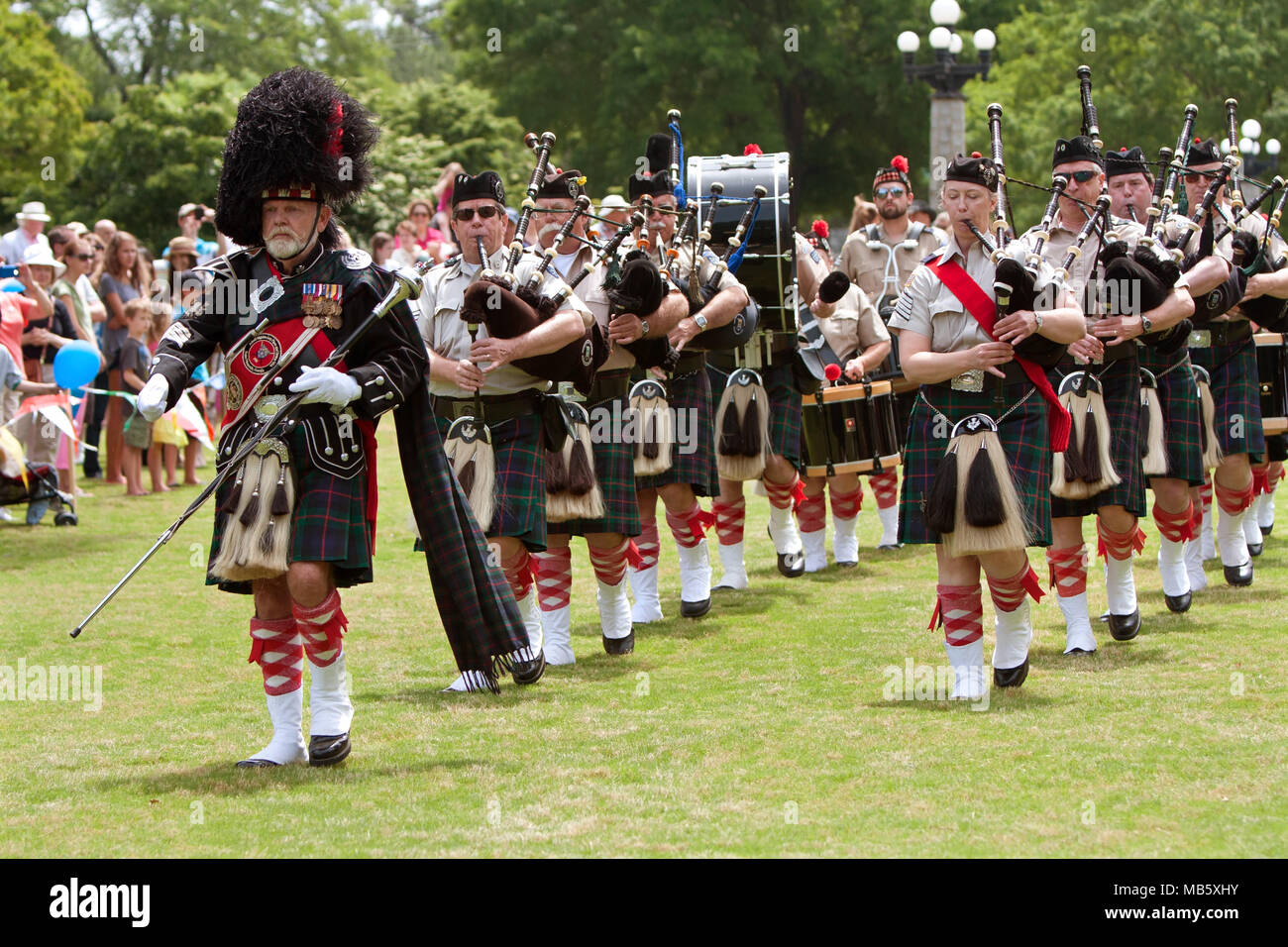 A drum major leads a local bagpipes group in opening the GREAT festival, celebrating Great Britain and the UK on May 25, 2013 in Atlanta, GA. Stock Photo