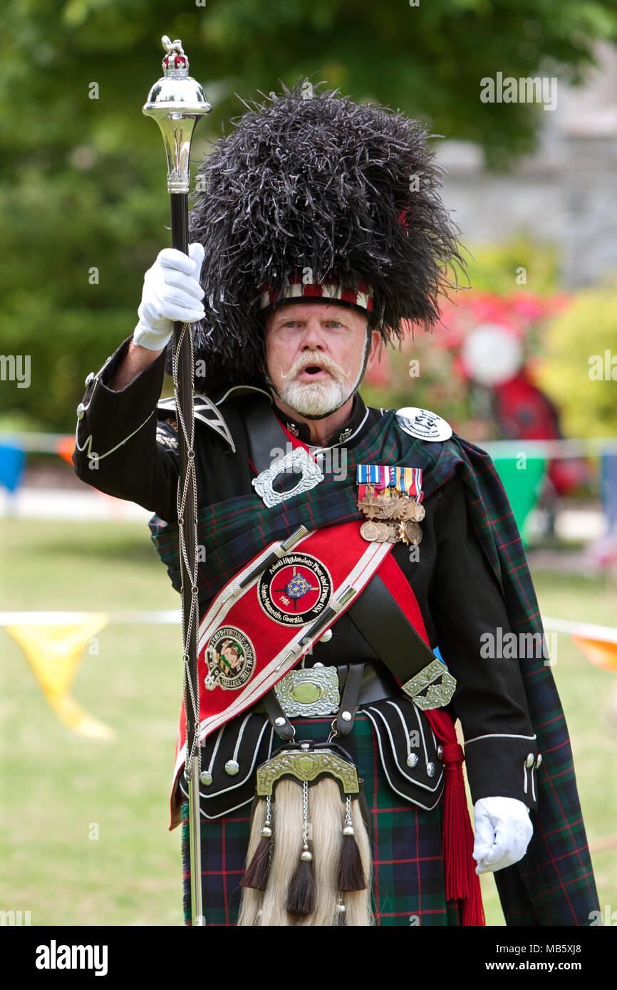 A drum major leads a local bagpipes group in performing at the GREAT festival, celebrating Great Britain and the UK on May 25, 2013 in Atlanta, GA. Stock Photo