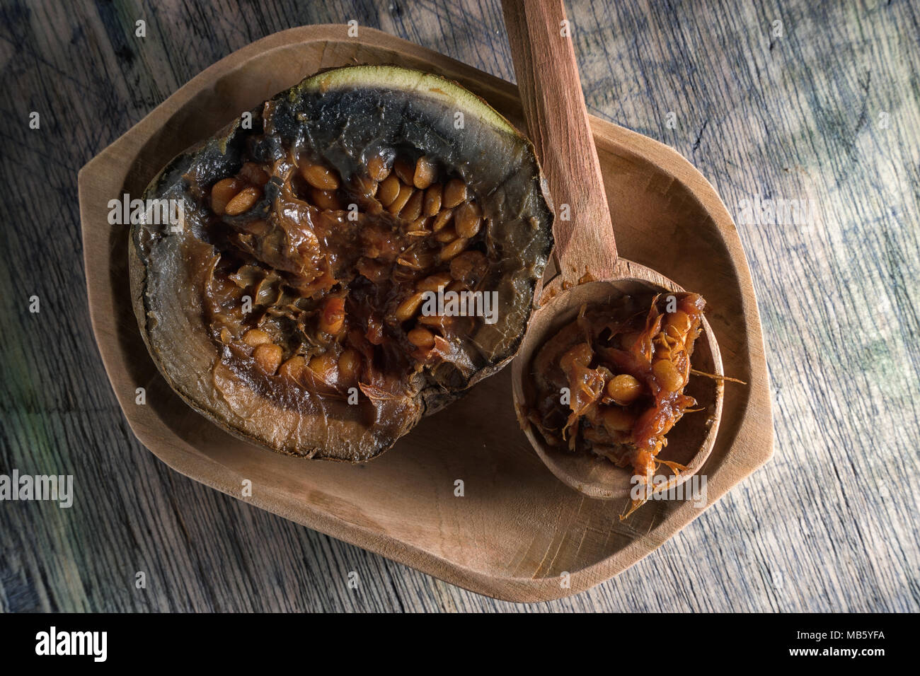 borojo fruit in a wooden bowl Stock Photo