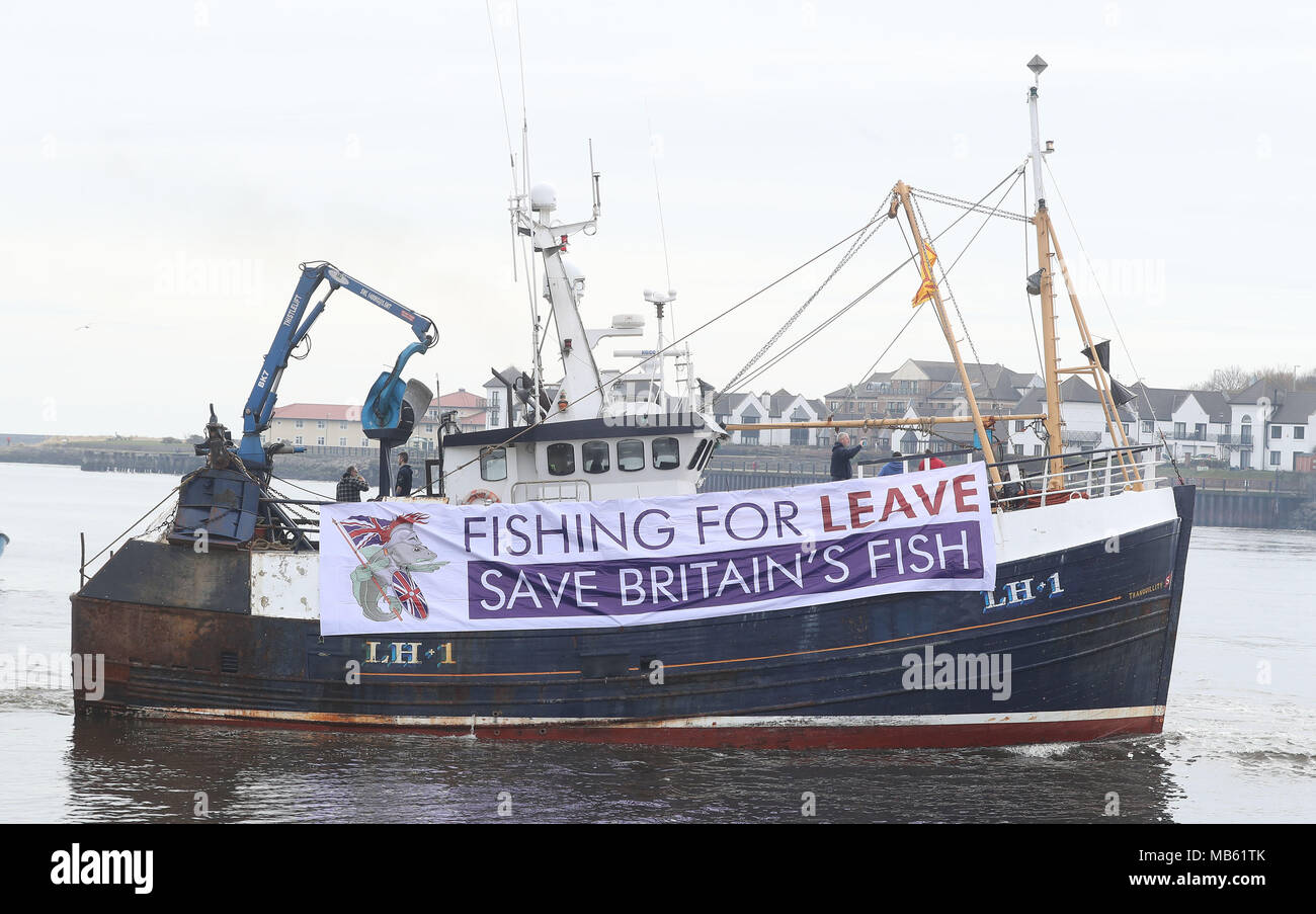 A flotilla of fishing boats leave South Shield Fish Quay, near Newcastle in a protest, organised by Campaign for an Independent Britain and Fishing for Leave, against the deal that will see the UK obeying the EU Common Fisheries Policy for the transition period of Brexit. Stock Photo