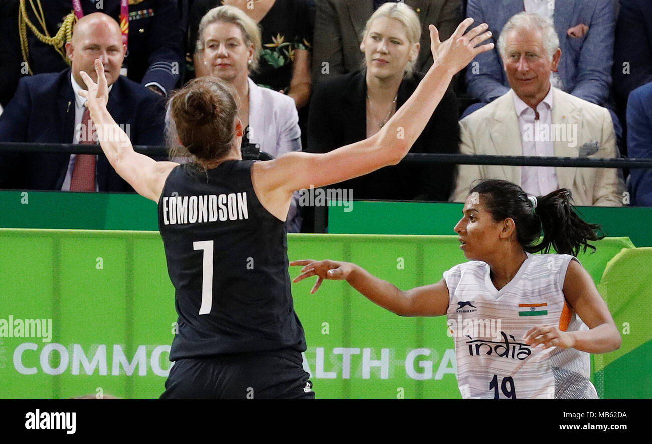 The Prince of Wales (right) watches a Commonwealth Games womens basketball match between New Zealand and India at the Cairns Convention Centre, Australia. Stock Photo