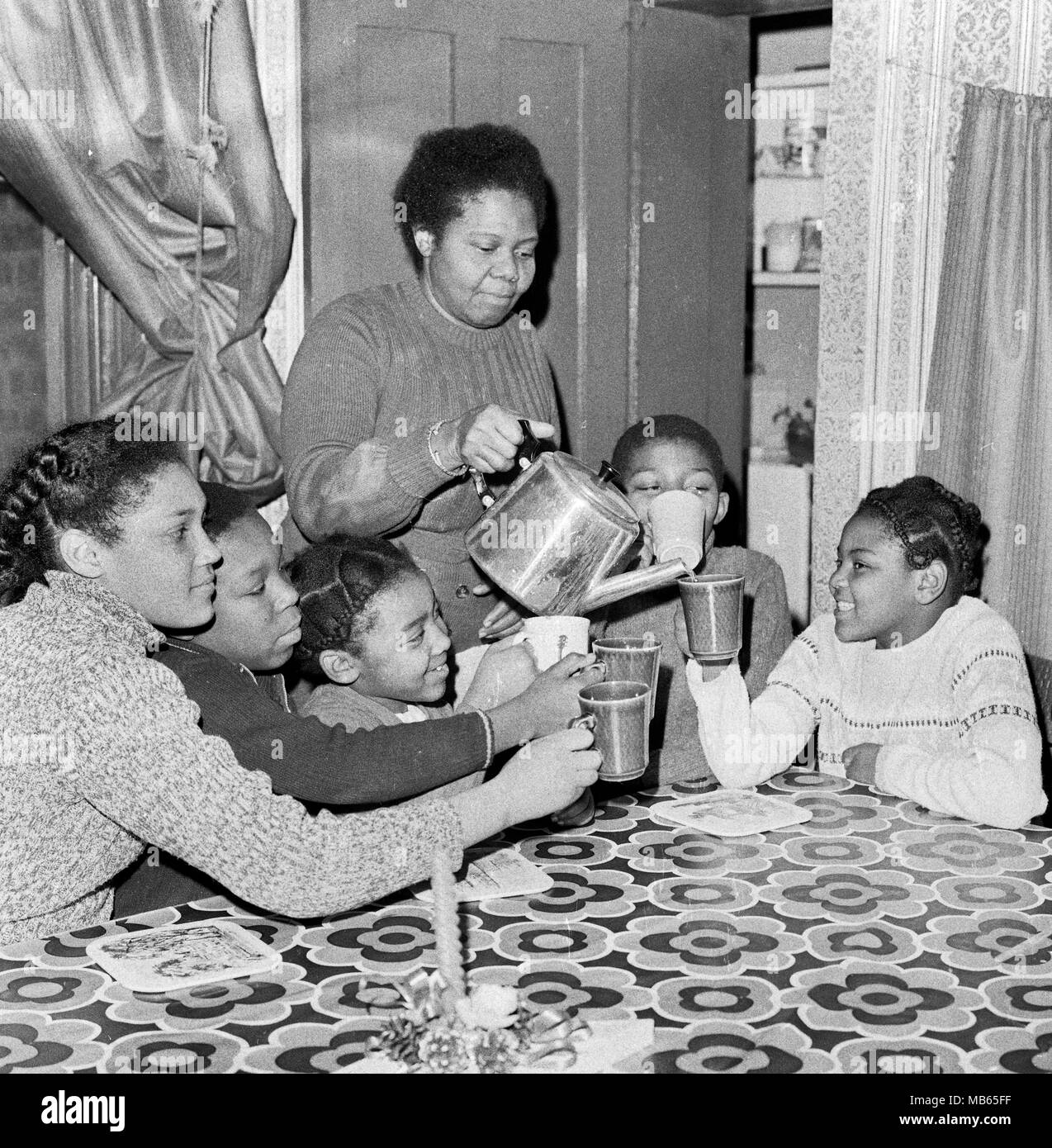 Foster mother Mrs Sybil Phoenix with some of her children in Lewisham in January 1973 the year she became the first black woman to receive an MBE. Stock Photo