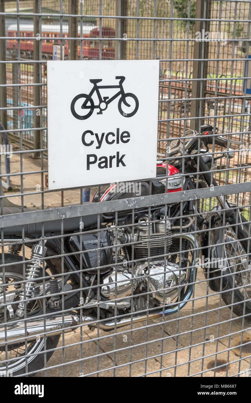 Sign for a Cycle Park - a motorcycle seen in the background Stock Photo ...