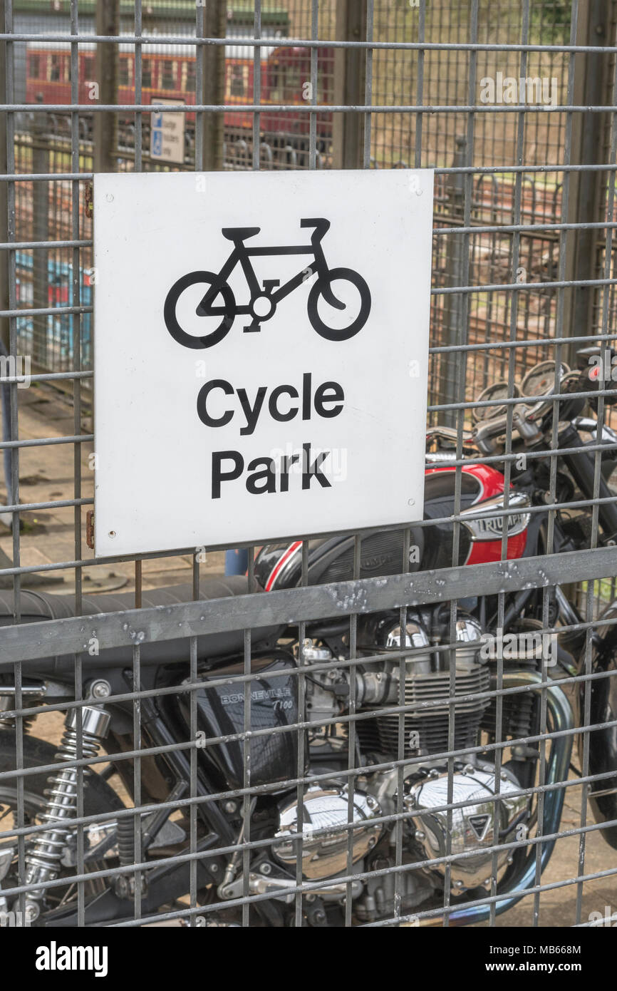 Sign for a Cycle Park - a motorcycle seen in the background Stock Photo ...