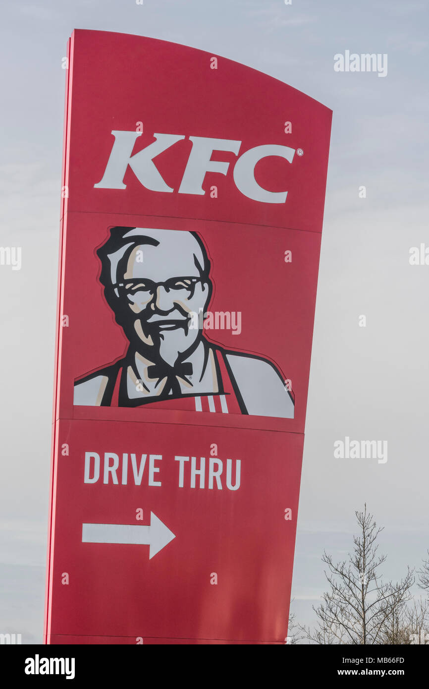 KFC Drive Thru signage at Bodmin (Cornwall) outlet. International Drive-Thru Day concept. Stock Photo