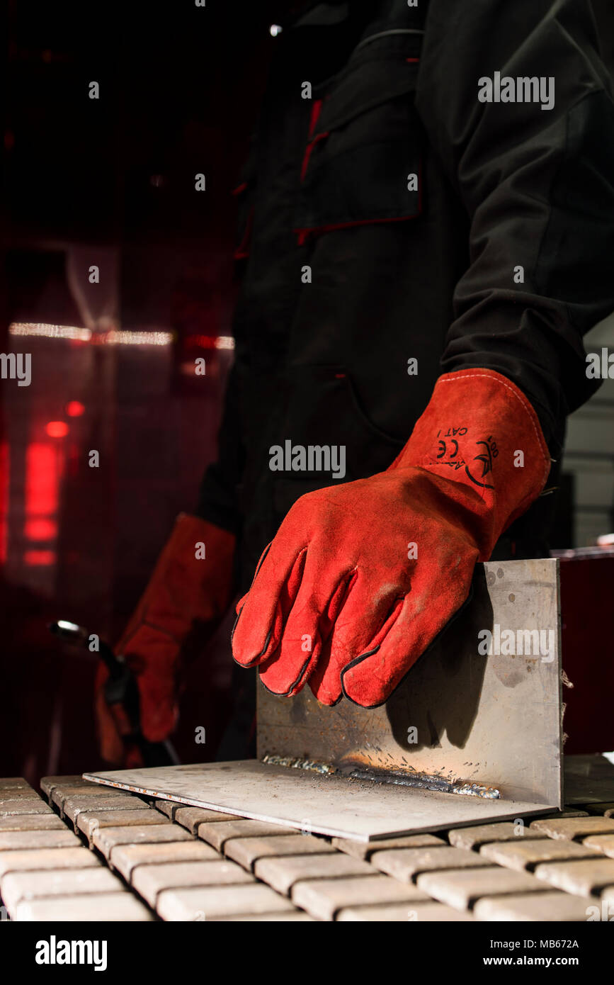 red protective leather welder gloves Stock Photo