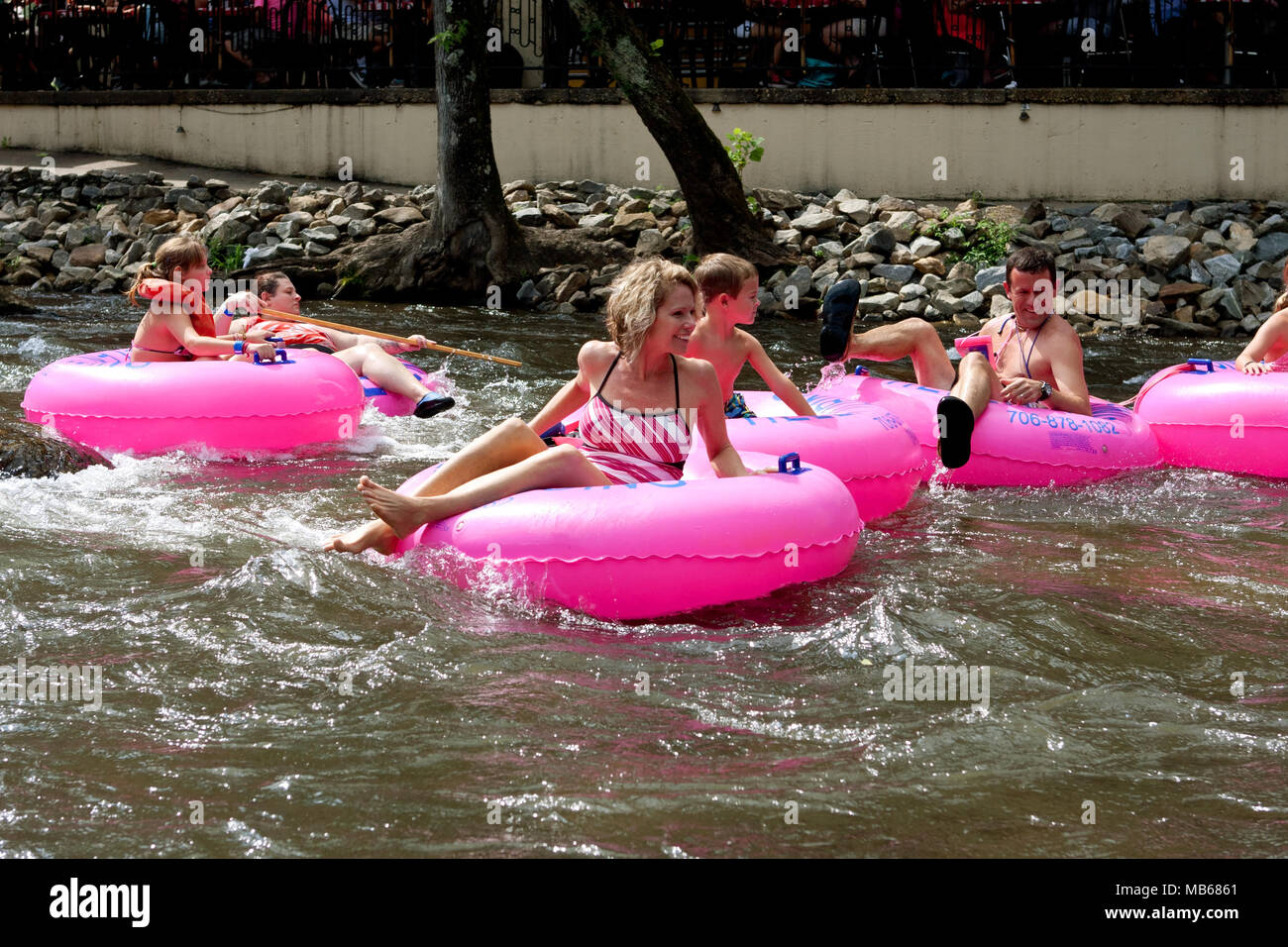 Helen, GA, USA August 24, 2013 A family enjoys tubing down the