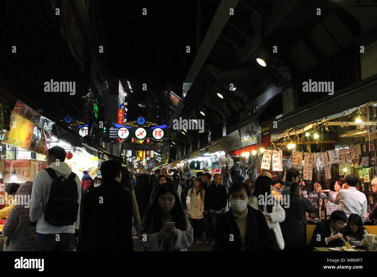 Translation: Ameyoko Shopping Street. The alleys around have food and other stalls. Taken in Tokyo, February 2018. Stock Photo
