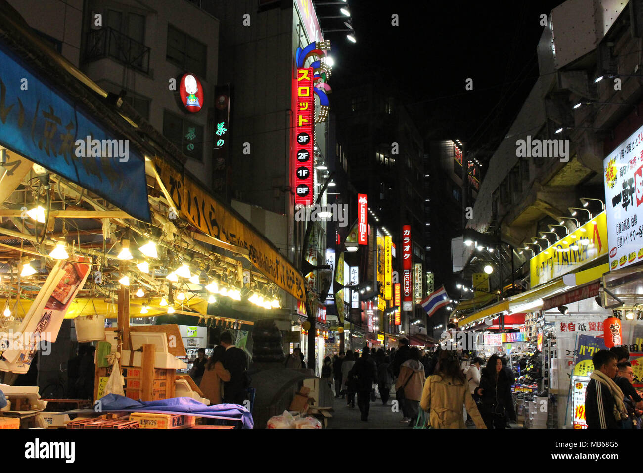 Translation: Ameyoko Shopping Street. The alleys around have food and other stalls. Taken in Tokyo, February 2018. Stock Photo
