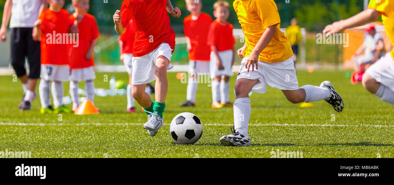Football Match For Children. Training and Football Soccer School Tournament. Group of Boys