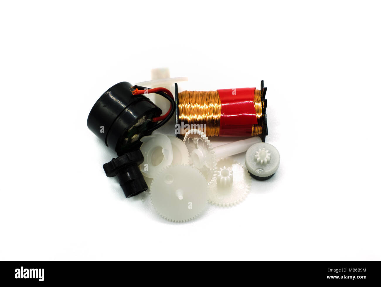 A bundle of old clock parts on a white background Stock Photo Alamy