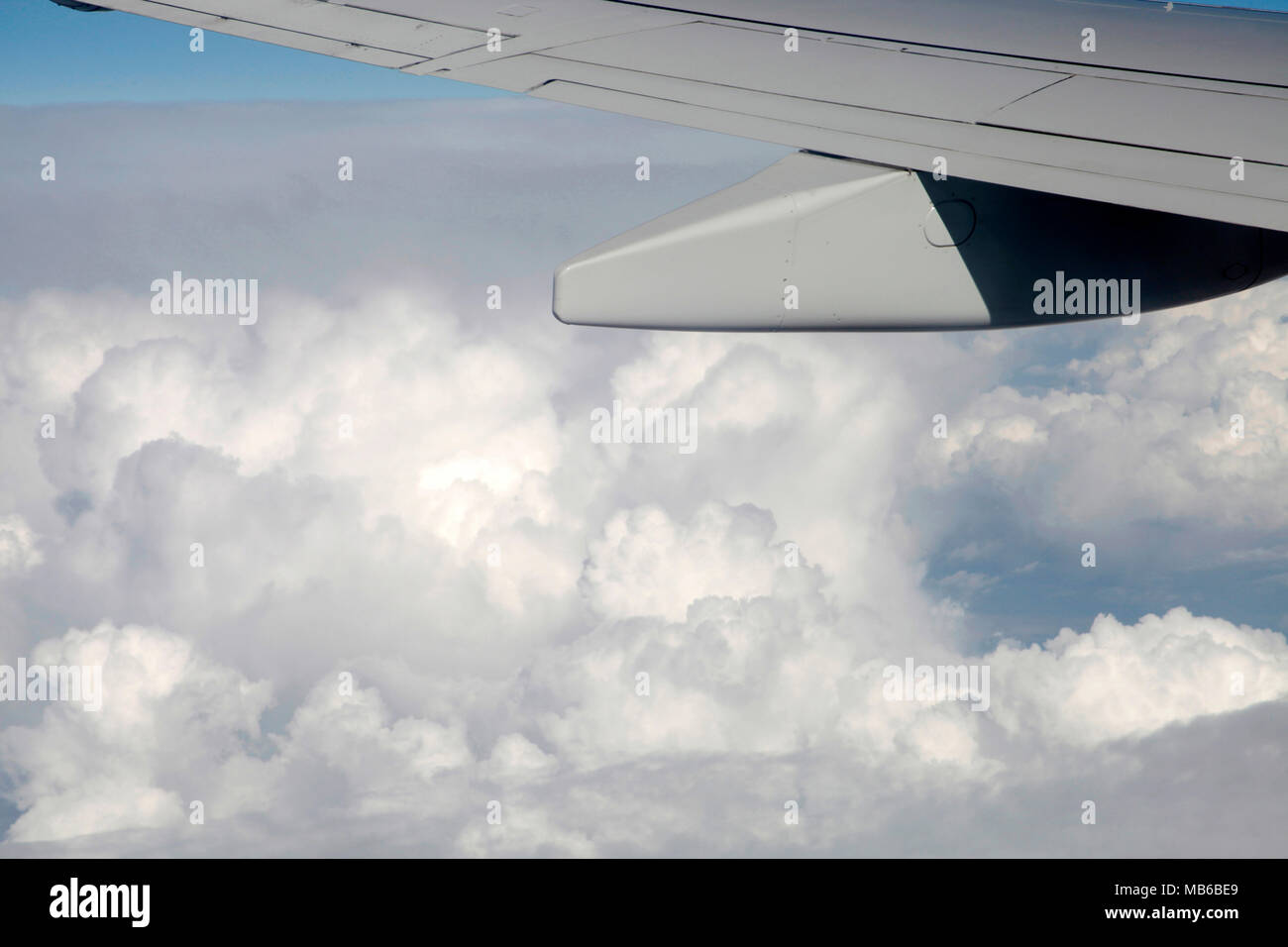 Plane flying over globe hi-res stock photography and images - Alamy