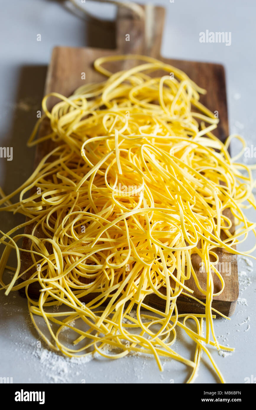 Raw tagliolini, type of italian pasta Stock Photo