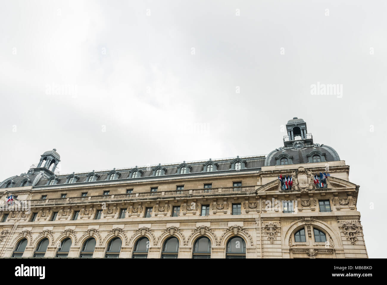 A low angle shot of the Musée dOrsay, which is housed on the Gare d'Orsay, an erstwhile railway station built in the Beaux-Arts style. Stock Photo
