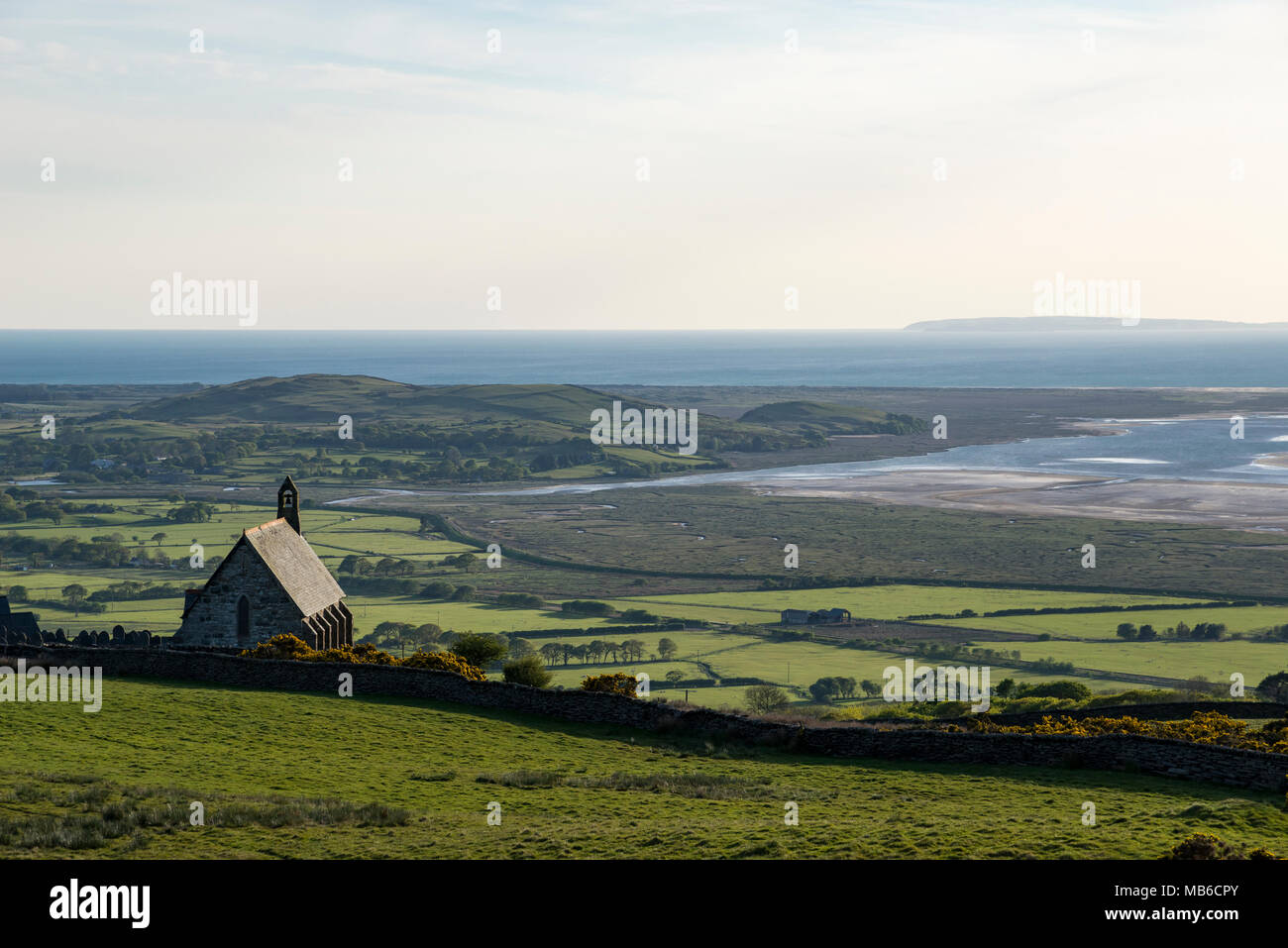 St Tecwyn's, a small church high in the hills near Harlech, North Wales. View over the Dwyryd estuary and Tremadog Bay. Stock Photo