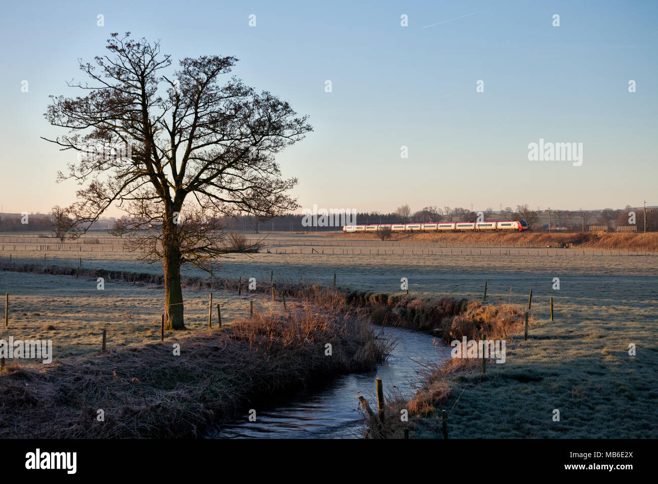 A Virgin Trains Pendolino train passing Plumpton (north of Penrith) on ...