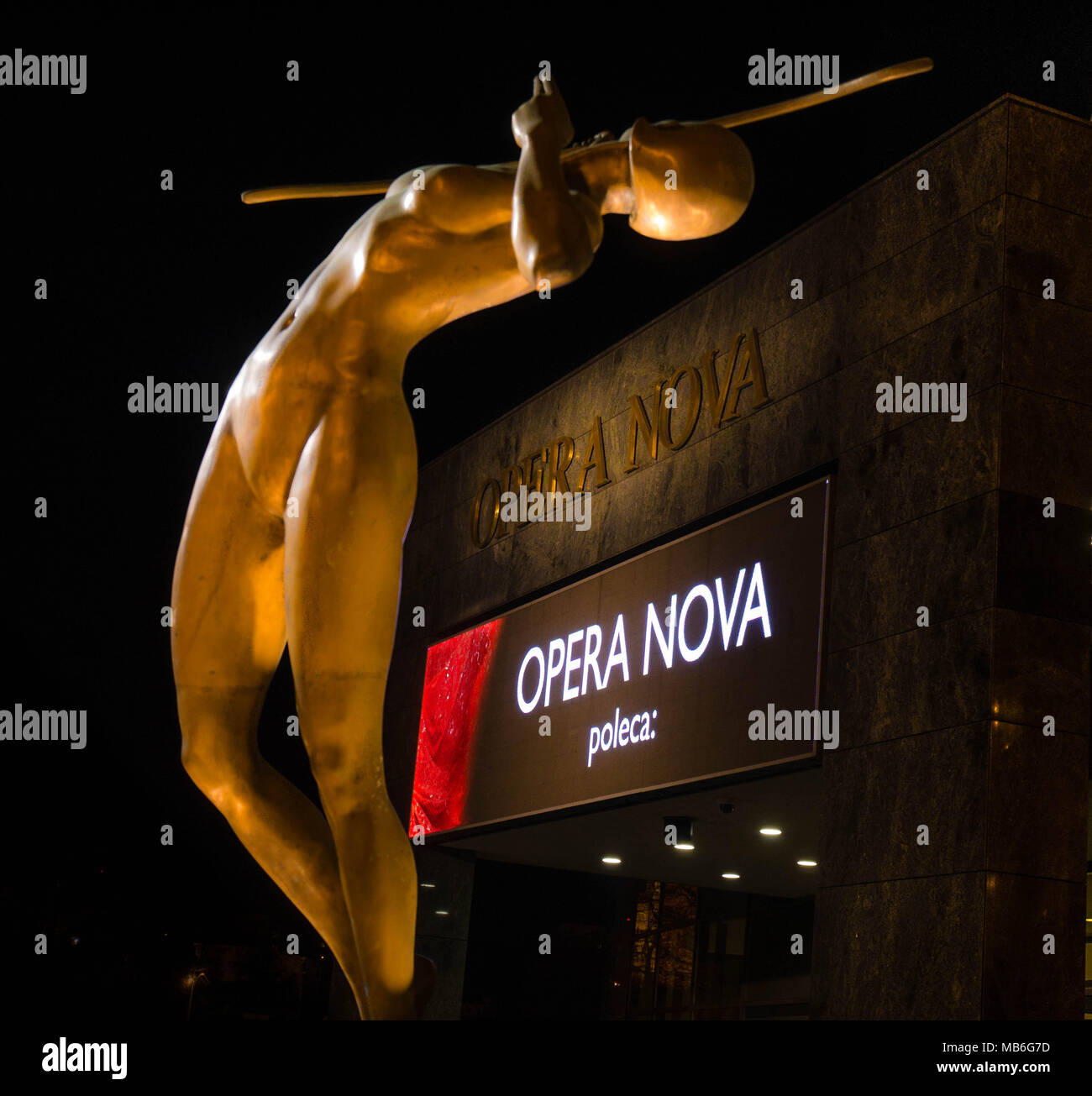 Sculpture 'New Archer' in front of the Opera in Bydgoszcz, Poland at nigh Stock Photo