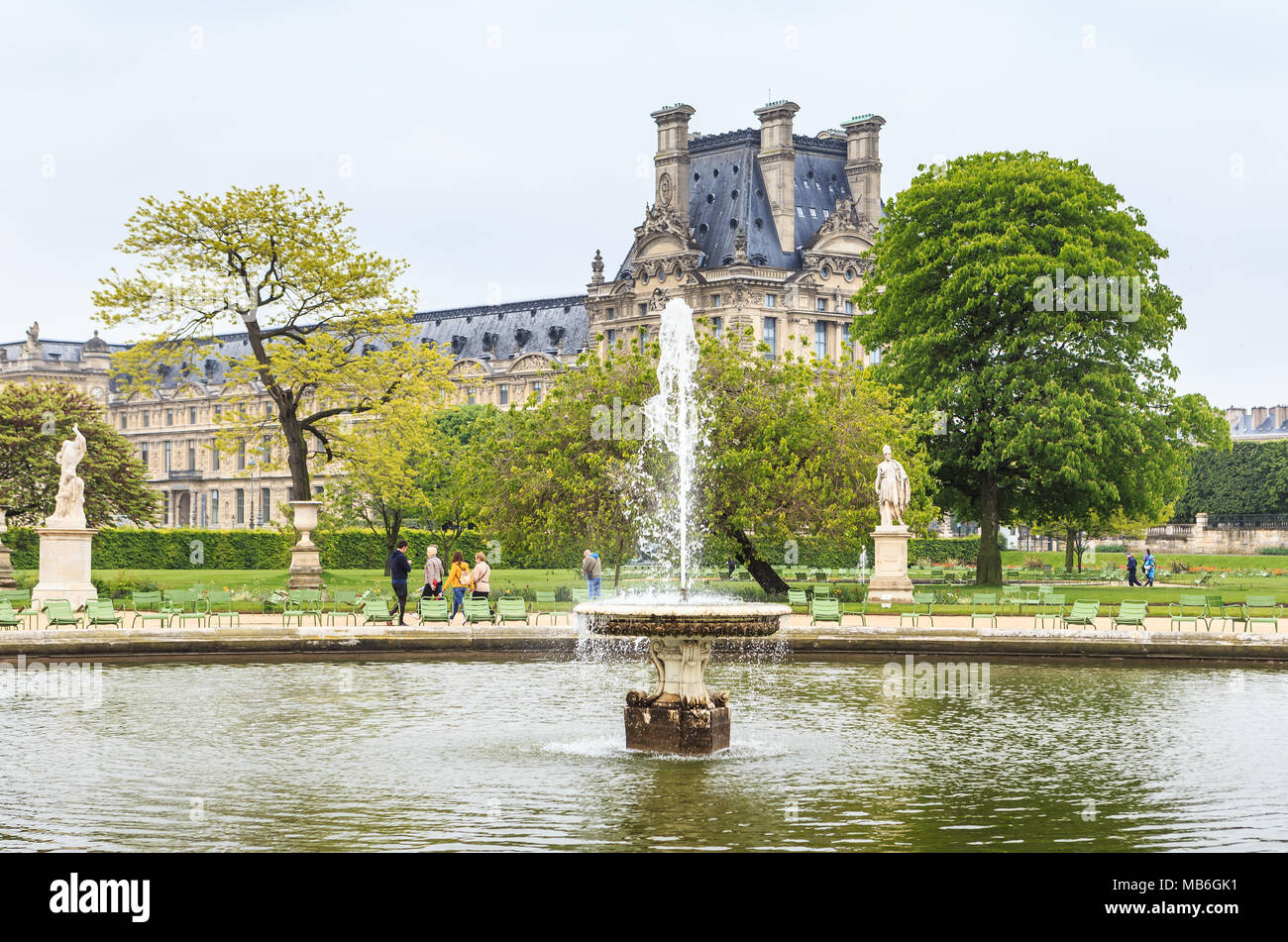View of Louvre building from Tuileries garden. Louvre Museum is one of the largest and most visited museums worldwide. Stock Photo