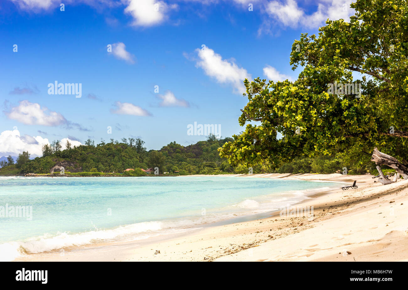 Paradise sandy beach and turquoise Indian Ocean on Silhouette Island, Seychelles Stock Photo