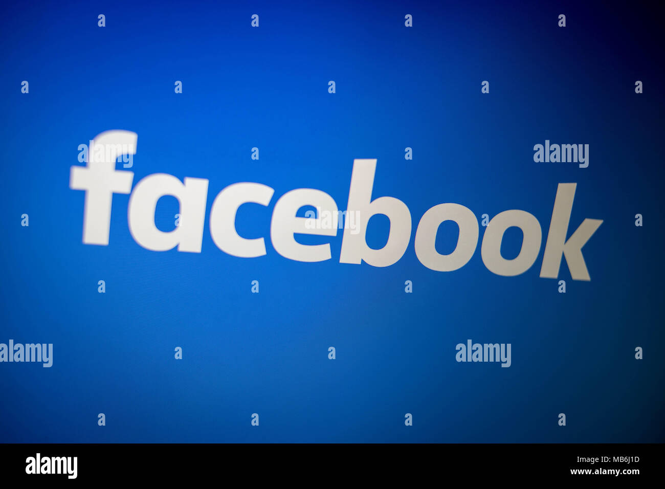In a photo illustration, the Facebook logo is seen on a computer screen, April 7, 2018. Stock Photo