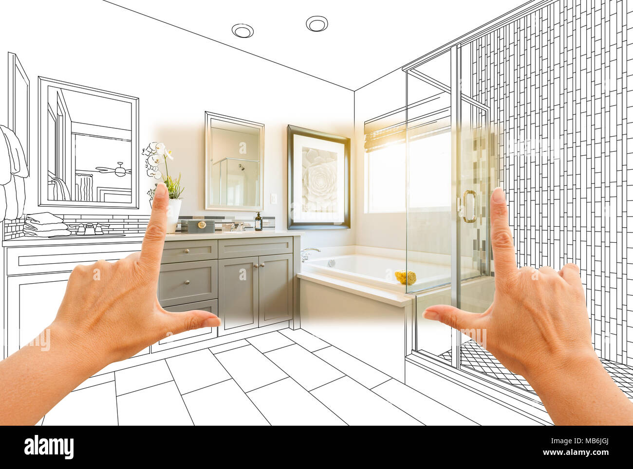 Hands Framing Custom Master Bathroom Photo Section with Drawing Behind. Stock Photo