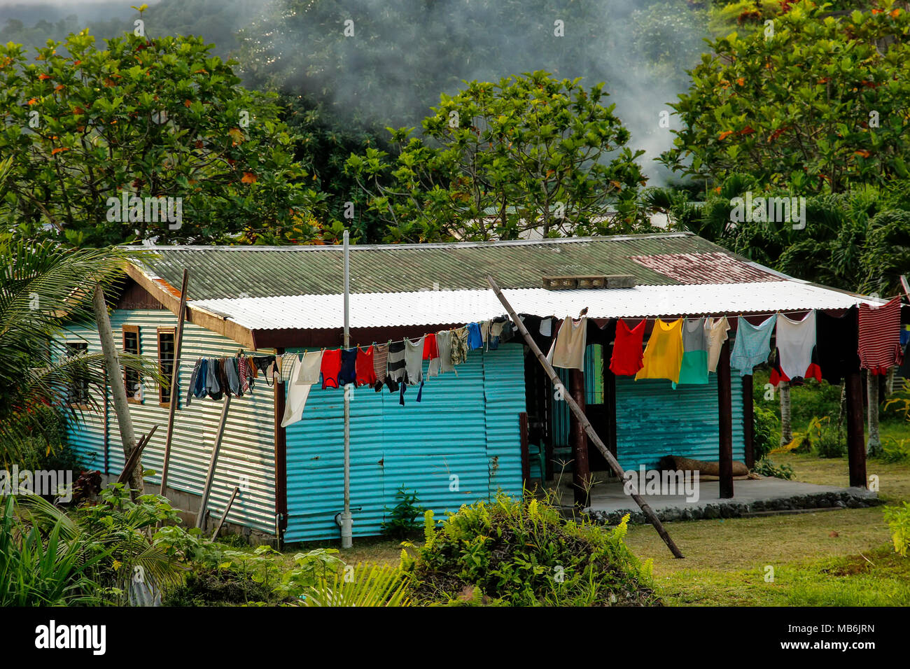 Typical fijian house in Lavena village on Taveuni Island, Fiji. Taveuni is the third largest island in Fiji. Stock Photo