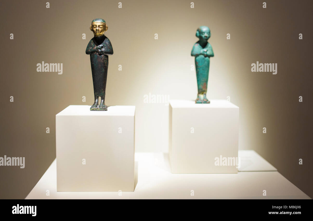 Madrid, Spain - November 10, 2017: Priest of Cadiz gold and bronze figurines at National Archaeological Museum Stock Photo