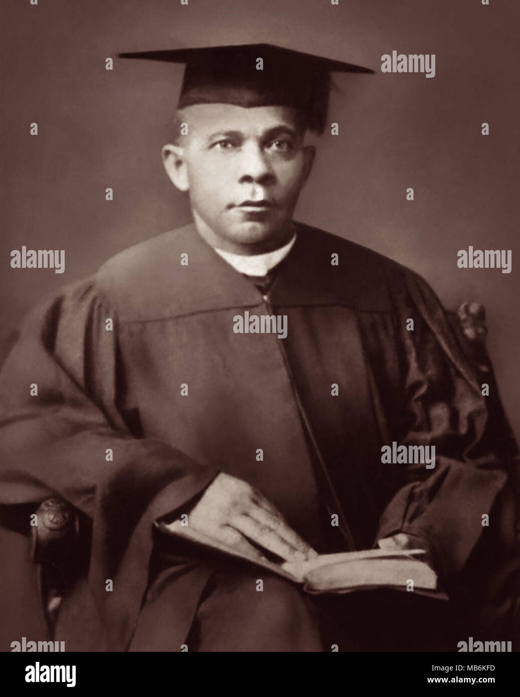 Booker T. Washington (c1856–1915), President of Tuskegee Institute (initially Tuskegee Normal School for Colored Teachers), in graduation cap and gown attire. Washington was also an author, orator, and advisor to U.S. presidents. Stock Photo