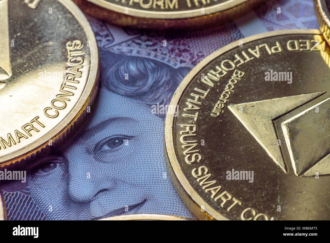 Ethereum coins stacked on new British Pound Sterling note, future concept  financial currency, crypto currency sign Stock Photo - Alamy