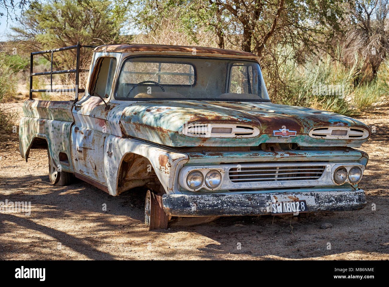 rusty classic car as decoration in Canyon Road House, Namibia, Africa ...