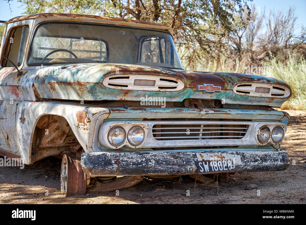 rusty classic car as decoration in Canyon Road House, Namibia, Africa ...