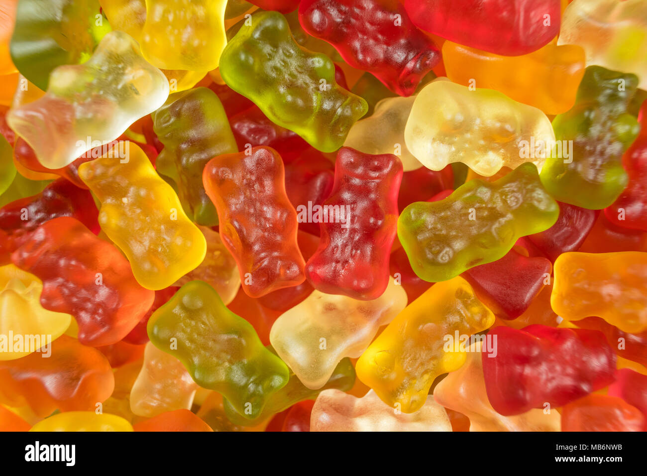 Colourful jelly babies / gummy bear candy sweets. Potential use as a background. Stock Photo