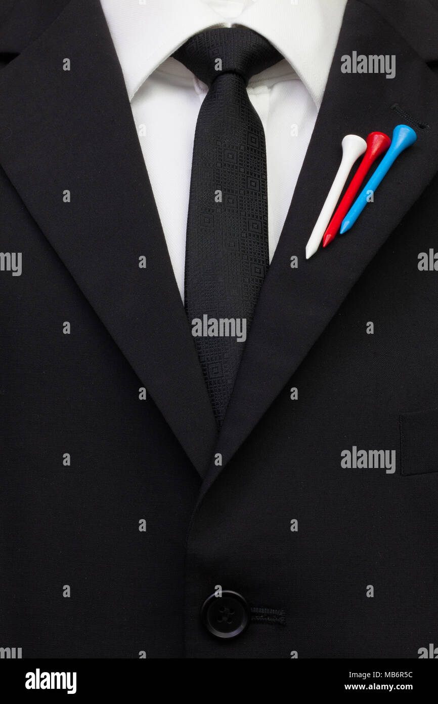 The detail of wedding suit with golf design.Golf tees in the color of the Russian    flag on the flap of black suit Stock Photo