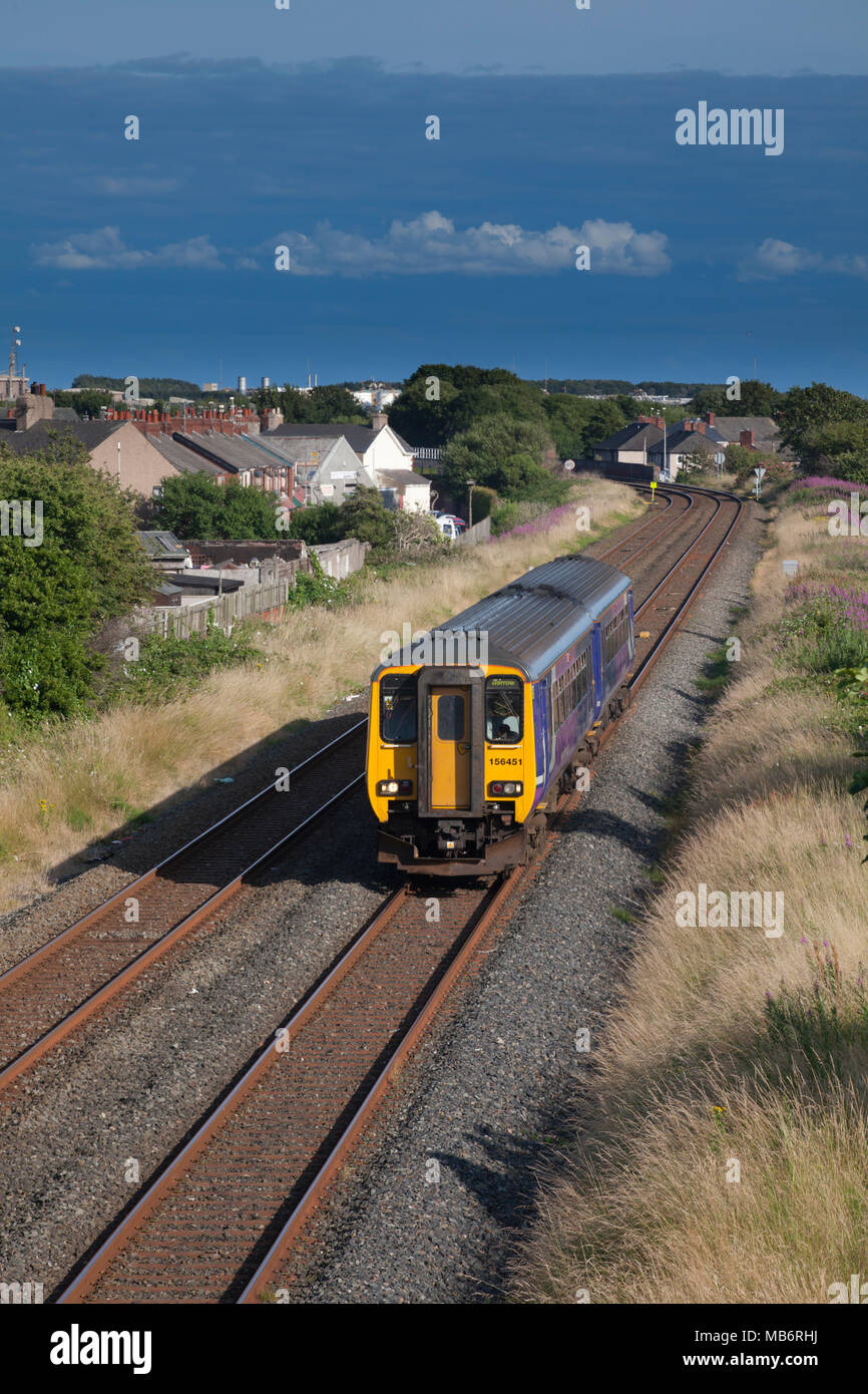 A Northern Rail class 156 sprinter train approaching Barrow in Furness
