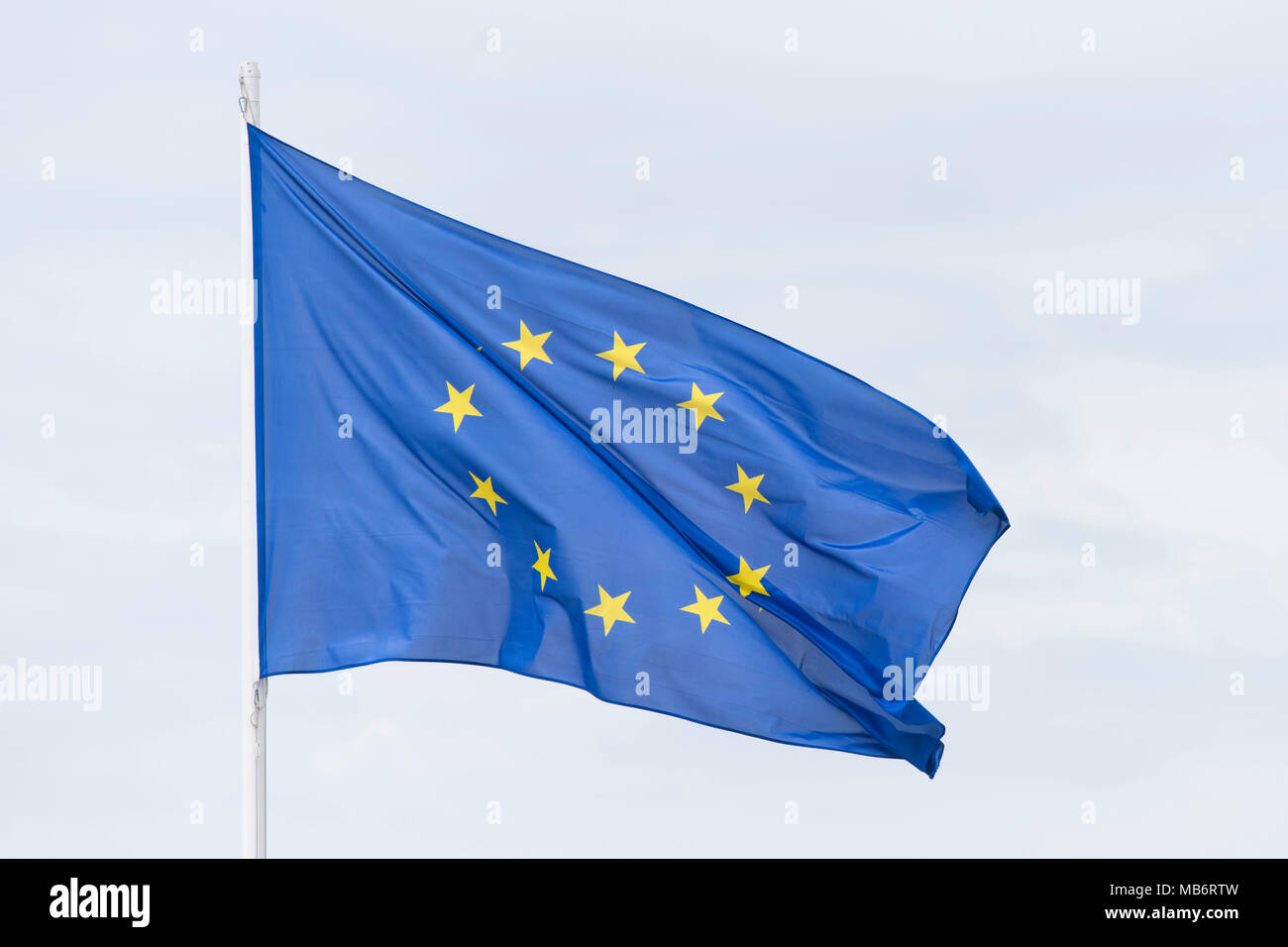 European Union (EU) flag flying in the wind. Stock Photo