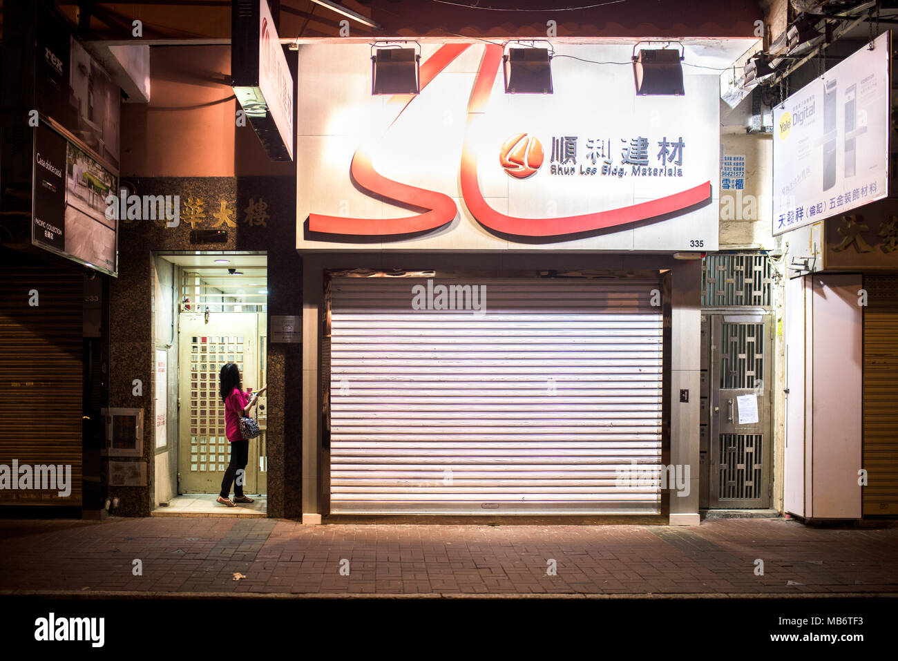 Streets of Hong Kong in Kowloon, at night Stock Photo - Alamy
