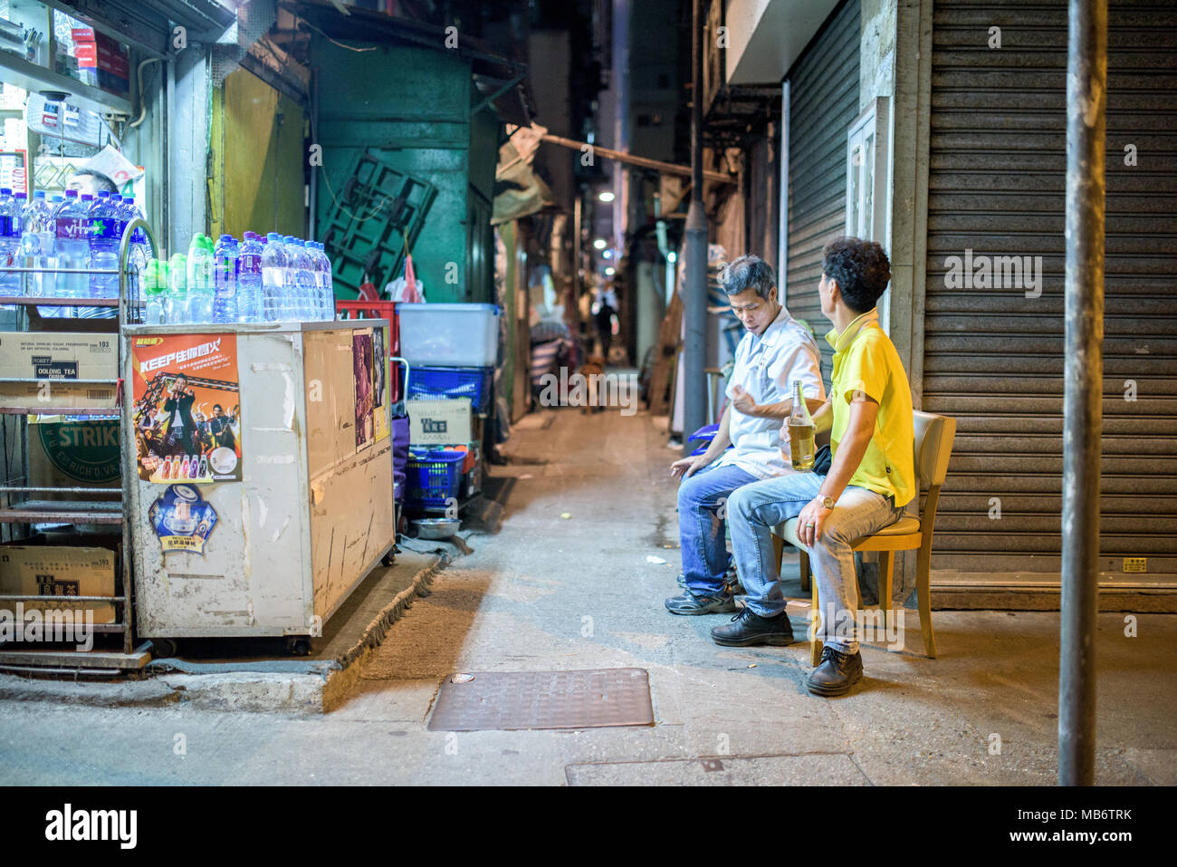Streets of Hong Kong in Kowloon, at night Stock Photo - Alamy