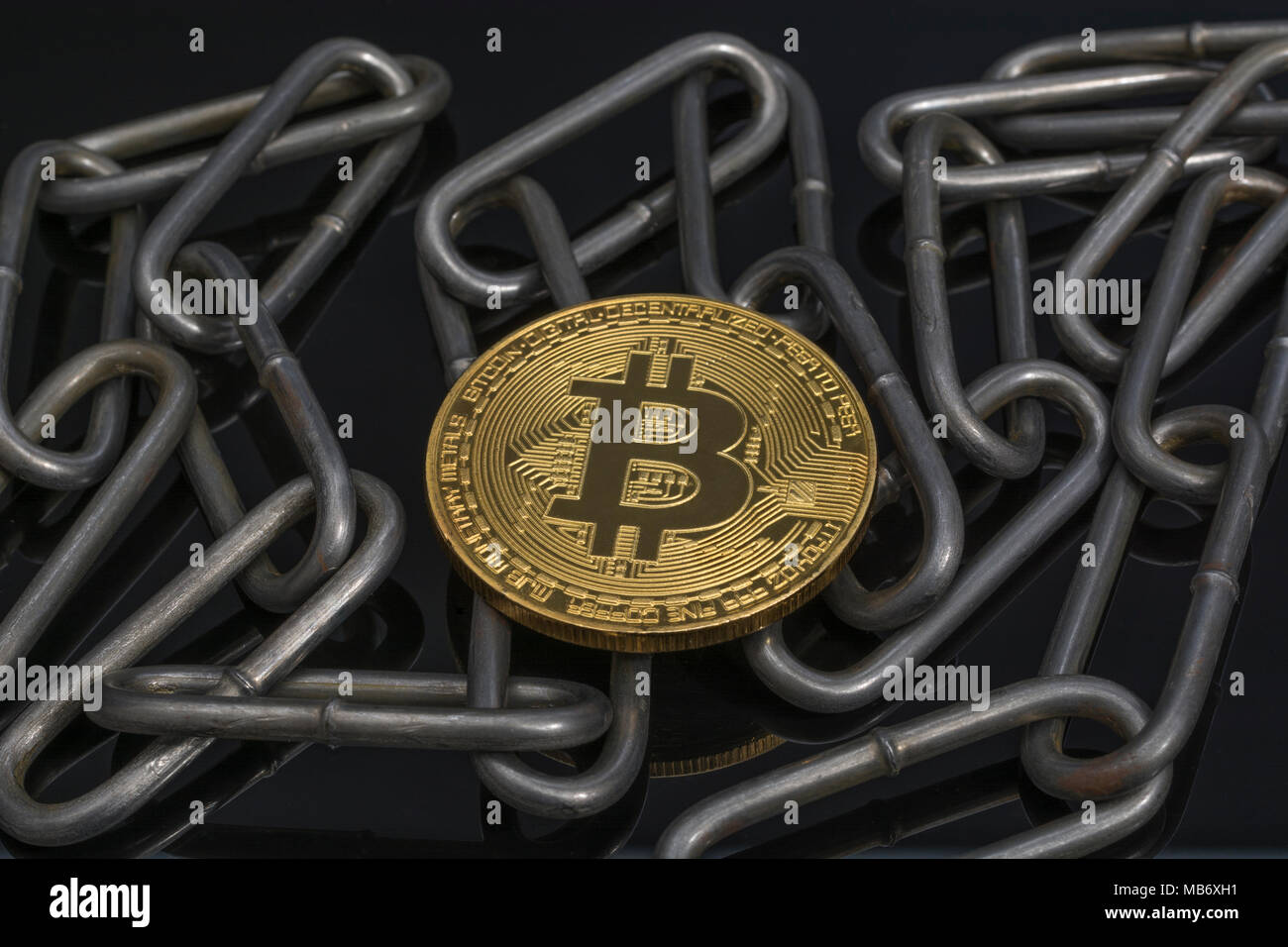 Metal chains with gold Bitcoin - as metaphor for cryptocurrency blockchain  concept. China Blockchain conference metaphor, bitcoin crypto Stock Photo -  Alamy