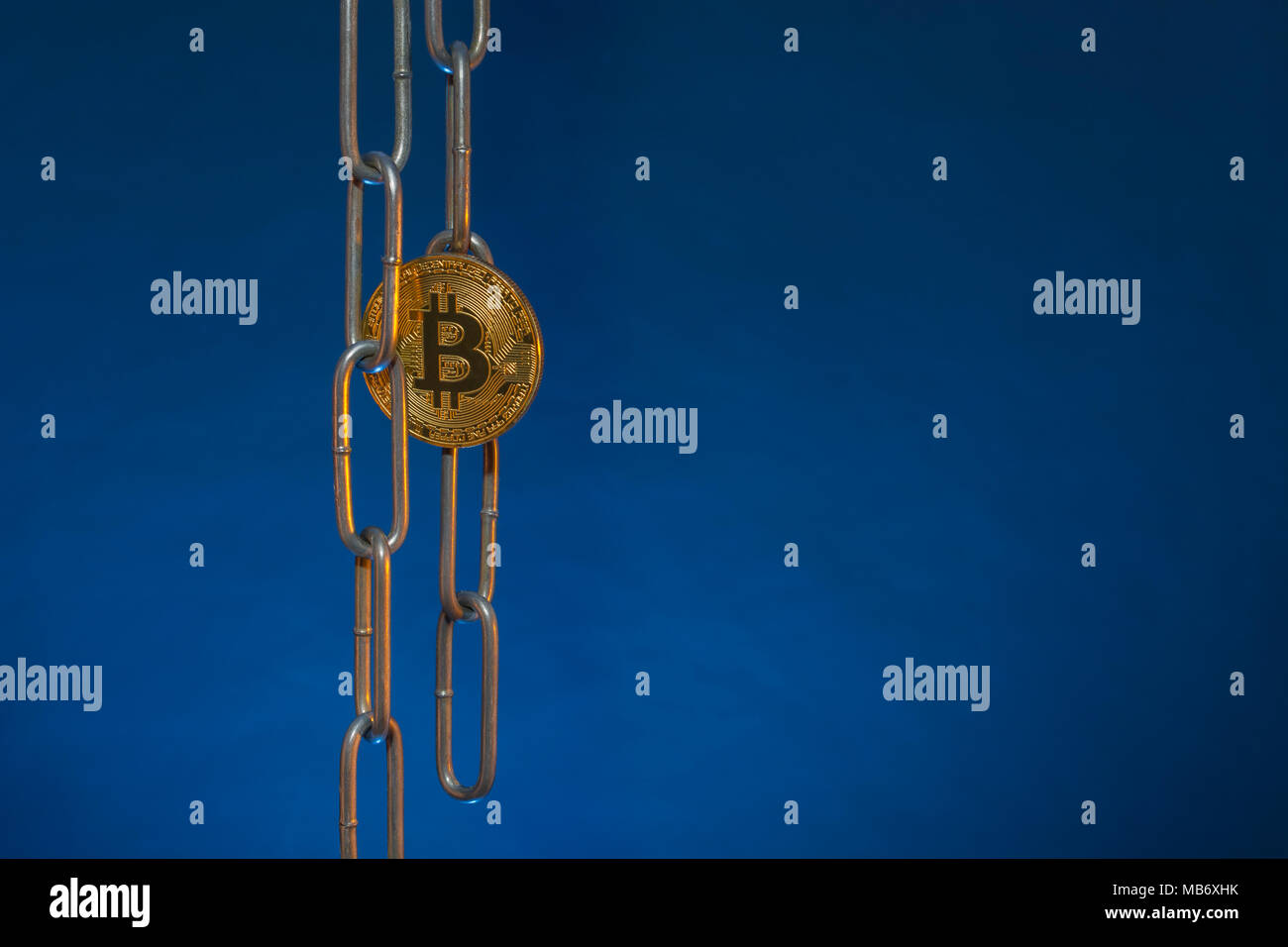 Metal chains with gold Bitcoin - as metaphor for cryptocurrency blockchain  concept. China Blockchain conference metaphor, bitcoin crypto Stock Photo -  Alamy
