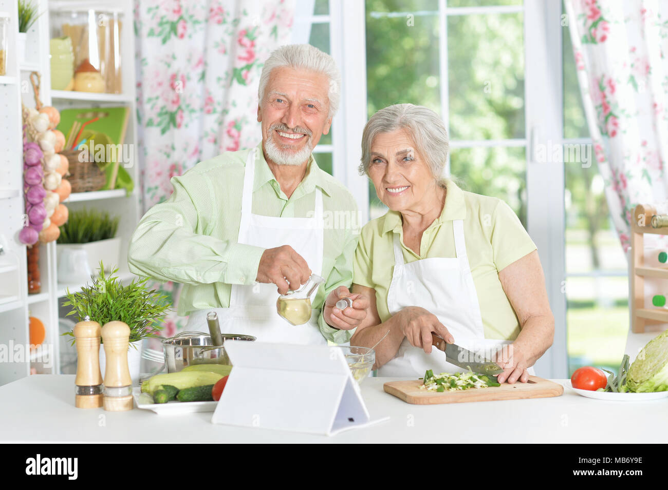 senior couple preparing dinner Stock Photo - Alamy