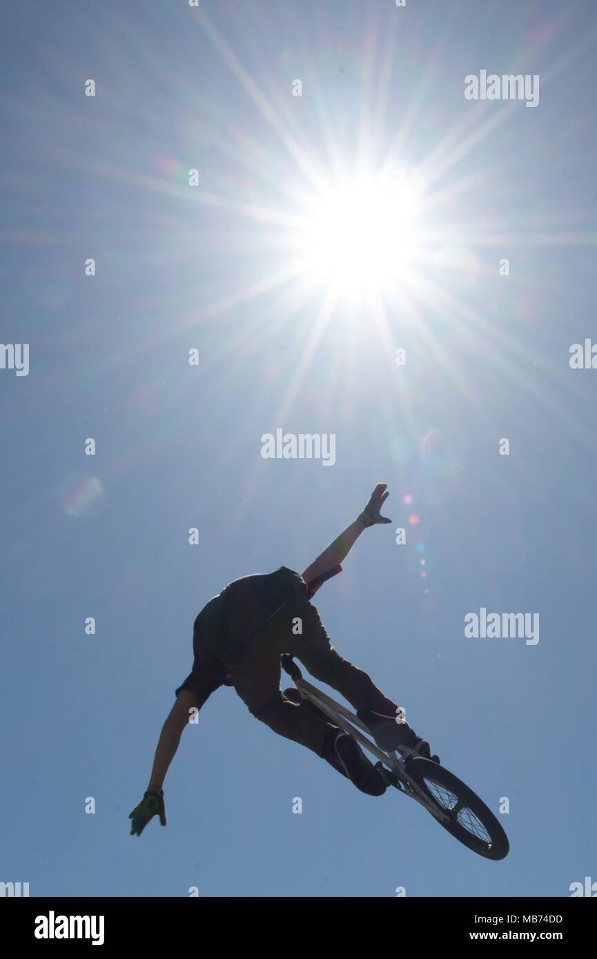 06 April 2018, Germany, Dresden A Bmxer performing a jump at a
