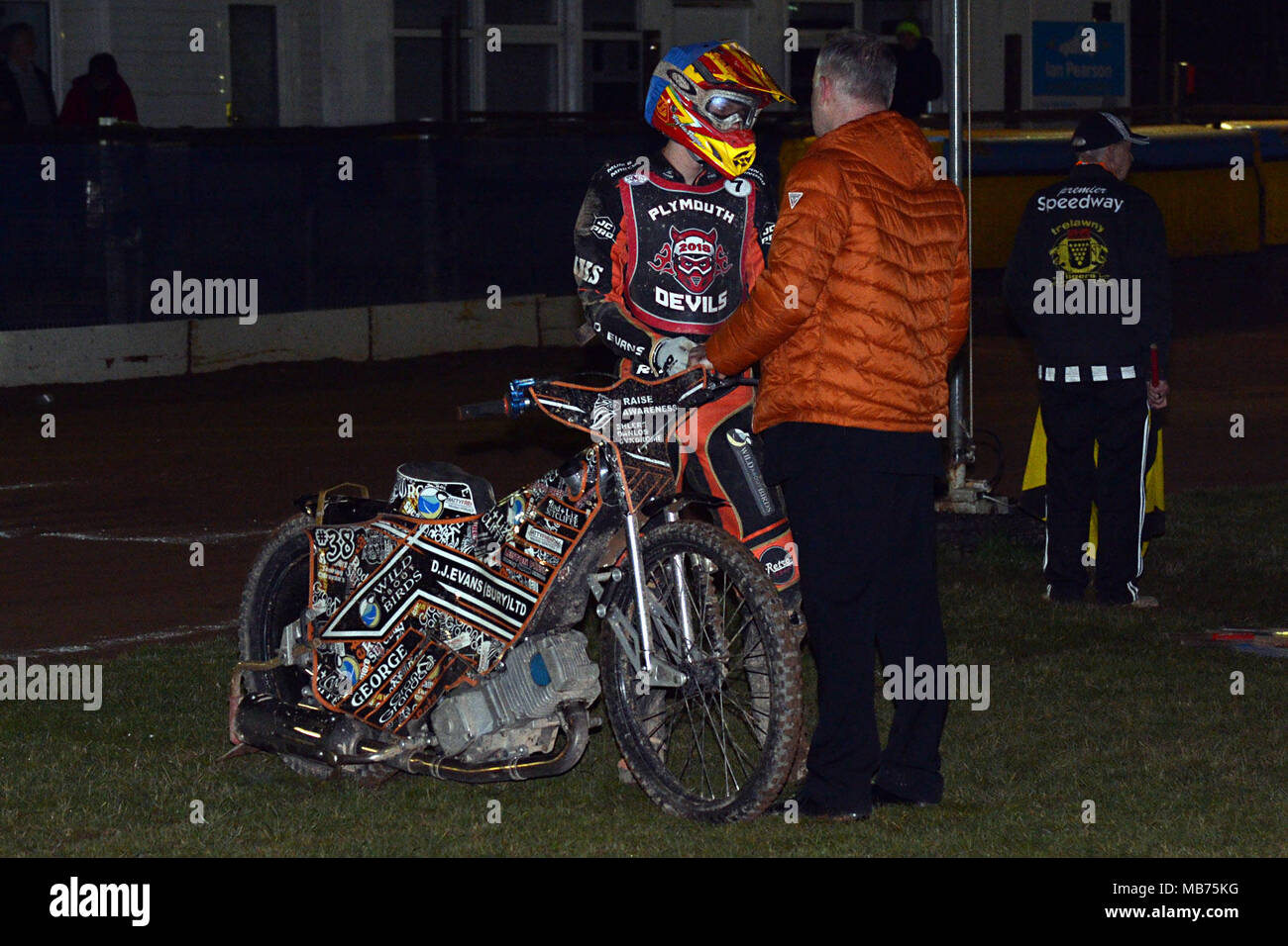 Plymouth, UK. 6th April, 2018. A frustrated Macauley Leek speaks with promotor Stuart Kellie after his bike fails on the line for the third attempt to start heat 12 of the National Trophy meeting against the Kent Kings. Nick Truscott Photography Ltd Credit: Nicholas Truscott/Alamy Live News Stock Photo
